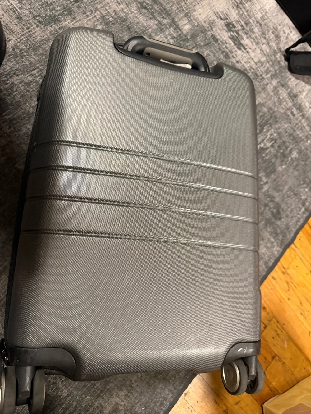 Unixes Gray Hard-Shell Spinner Carry-On Luggage from Macy’s wads $160